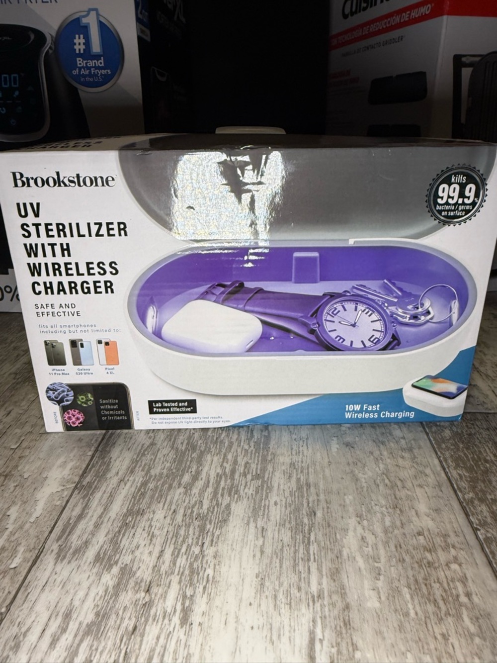 Brookstone UV Sterilizer with Wireless Charger - White Exterior, Purple Interior